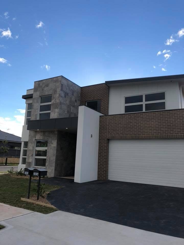 Modern two-storey home, White render and brick, by Luxe Effects