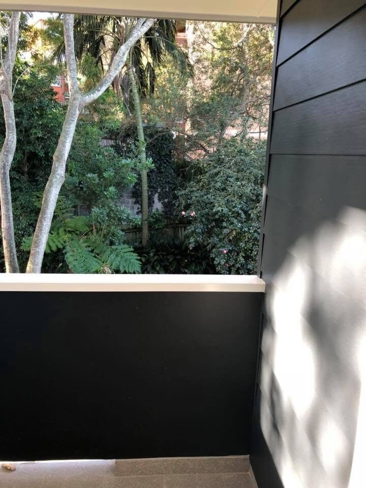 Apartment balcony walls, Charcoal black render, by Luxe Effects